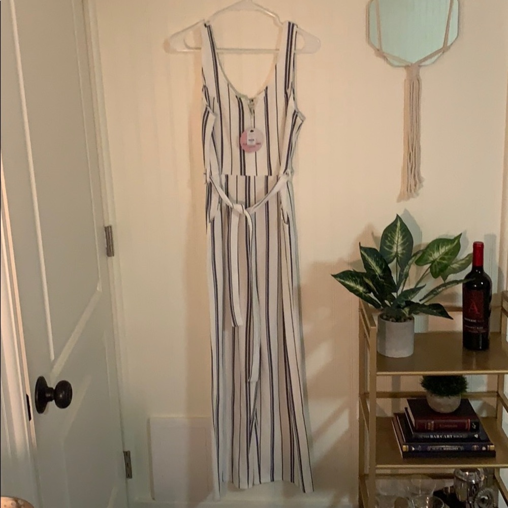 Full Circle Trends • white stripped jump suit